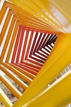 Mexico, Mexico City, Red and yellow geometric sculpture inEspacioEscultoricoUNAM