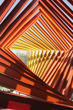 Mexico, Mexico City, Red and yellow geometric sculpture inEspacioEscultoricoUNAM