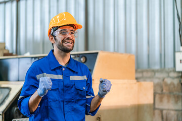 Professional male caucasian engineer or manufacturing worker man person in factory portrait, smart industry business manager occupation job with safety helmet for construction work, machinery foreman