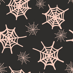 Scattered spiderwebs creating a halloween spooky scene forming a seamless vector pattern with pastel peach over black. Great for home decor, fabric, wallpaper, gift-wrap, stationery and packaging