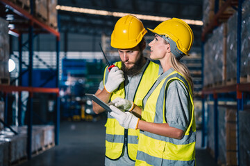 professional technician engineer checking mechanical factory equipment for using on industry machine, foreman with safety hard hat helmet working to maintenance control production job in manufacturing