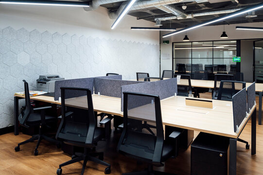 Chairs and desk arranged in modern office