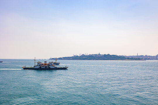 Istanbul view with a ferry boat from Maiden's Tower