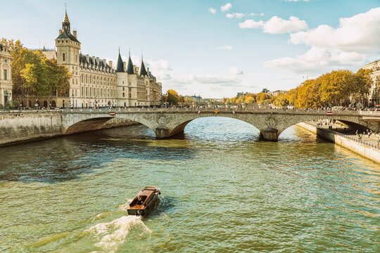 France, Ile-De-France, Paris, Motorboat at Pont au Change bridge