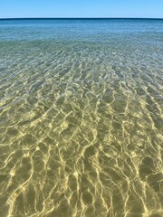 Transparent sea water, crystal sea water, natural azure sea water background