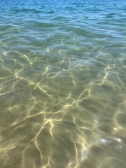 Fototapeta na wymiar Transparent sea water, crystal sea water, natural azure sea water background