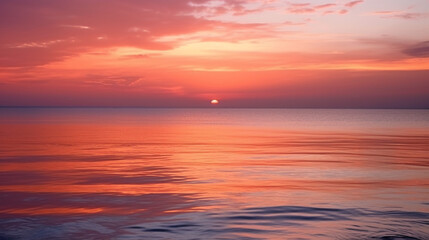 Obraz premium Golden Hour: Stunning Pink Ocean Sunset with Cloudy Sky - Serene Coastal Evening Landscape in the Magic Hour