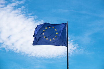 European Union flag isolated on blue sky background