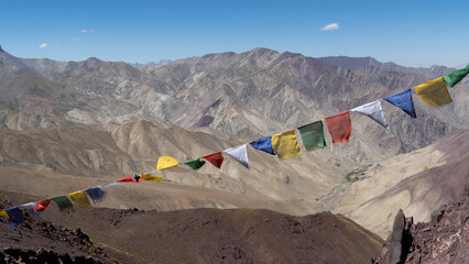 Buddhist prayer flags on a mountain pass in Ladakh, India