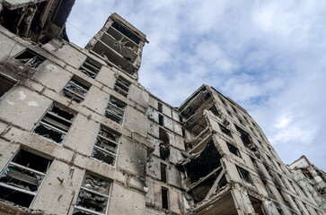 destroyed and burned houses in the city during the war in Ukraine