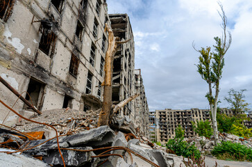 destroyed and burned houses in the city during the war in Ukraine
