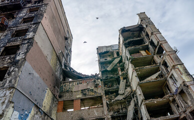 destroyed and burned houses in the city during the war in Ukraine