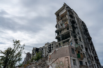 destroyed and burned houses in the city during the war in Ukraine