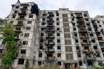 destroyed and burned houses in the city during the war in Ukraine