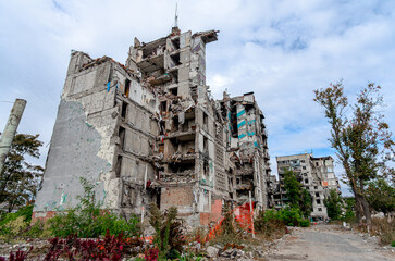 destroyed and burned houses in the city during the war in Ukraine