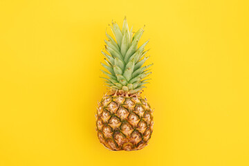 ripe pineapple isolated on white background. Bright pineapple in minimal style. Fresh pineapples on blue background. Tropical fruits. Vegetarianism. Summer fruits. - obrazy, fototapety, plakaty