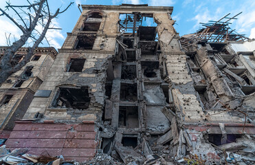 destroyed and burned houses in the city during the war in Ukraine