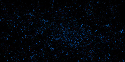 Balck modern abstract background with blue dots. mall particles of debris and dust. Blue Distressed uneven background. Falling snowflakes on night sky background. Grainy abstract texture on a black.