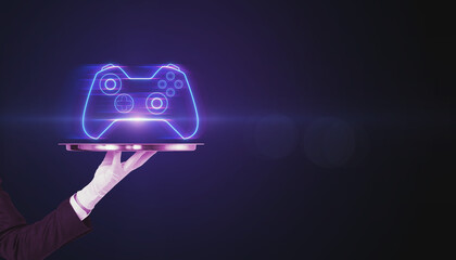Closeup of businessman hand holding silver tray with creative joystick or gamepad hologram on blurry purple bokeh background. Esport, gaming and fun concept. © Who is Danny
