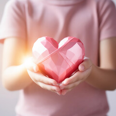 Obraz premium Girl hands holding pink heart, Happiness moment, Health care, donate and family insurance concept, World heart day, world health day, Hope, Gratitude, Kindness, Valentine's Day. Generative AI.