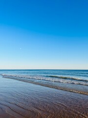 Tender blue sea horizon, blue sea and blue sky, evening light