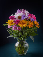 Bright beautiful bouquet of yellow white and red flowers, fragment, close. High quality photo