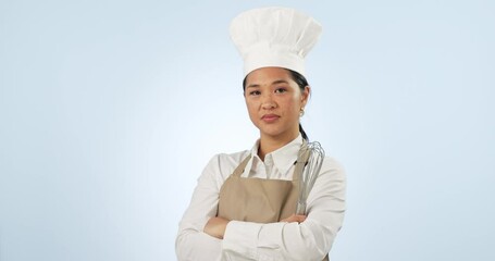 Asian woman, chef and professional with arms crossed in confidence for bakery against a studio background. Portrait of confident female person or baker with tools for hospitality or food on mockup