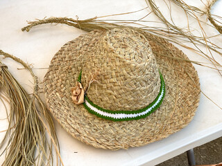 spanish hat made with esparto grass and andalusian flag