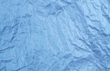 Blue crumpled paper texture pattern. Rough grunge old blank.