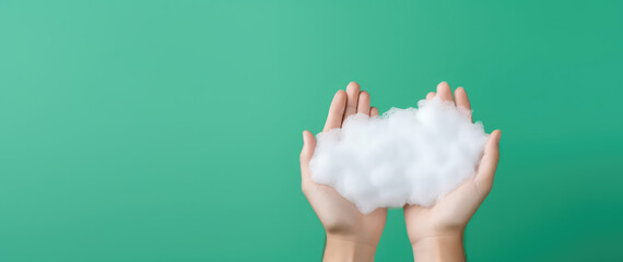 White soap foam in female hands isolated on flat green background with copy space.  - obrazy, fototapety, plakaty