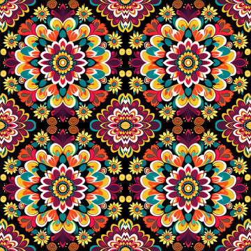 Ethnic floral seamless pattern. Abstract ornamental pattern, kaleidoscope fabric design