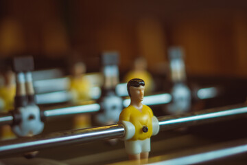 A foosball table is a recreational game symbolizing entertainment, skill, and socializing. It...