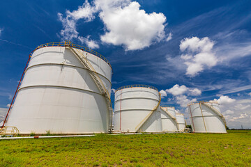 Tank farm in industry Thailand with white oil and petrol silos