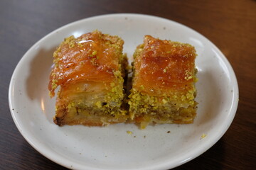 baklava, rich Middle Eastern cake made of thin layers of flaky pastry filled with nuts and honey