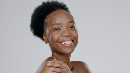 Face, skincare and beauty of happy black woman in studio isolated on a gray background mockup...