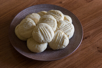 Homemade corn flour gluten-free cookies on ceramic plate, selective focus