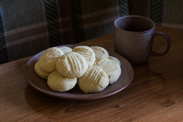 Homemade corn flour gluten-free cookies on ceramic plate, selective focus