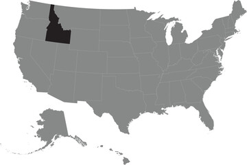 Black CMYK federal map of IDAHO inside detailed gray blank political map of the United States of America on transparent background