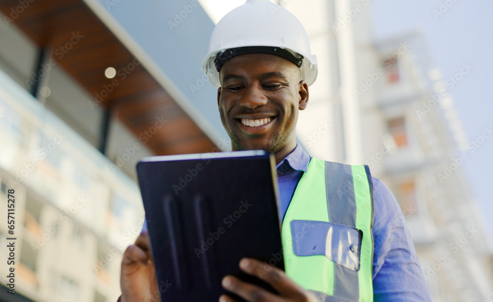 Poster black man in construction, tablet and architect working on floor plan, inspection and maintenance jo