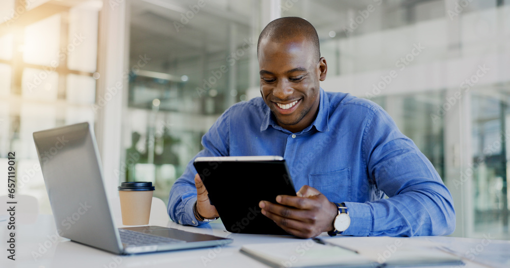 Wall mural Laptop, tablet and happy with a business black man in the office for research on a company project. Computer, technology and smile young developer in a workplace for internet or software design