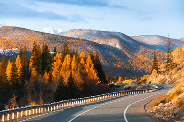 Beautiful road in autumn mountains. Chuysky tract in Altai, Siberia, Russia.