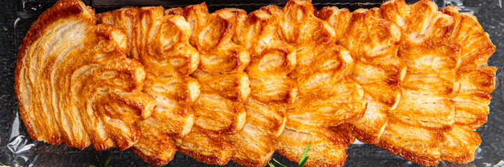 christmas cookie puff pastry biscuits sweet dessert puff sfoglie holiday treat new year and christmas  meal food snack on the table copy space food background rustic top view