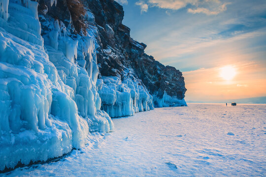 Ogoy island on winter Baikal lake with ice on the rocks. Baikal, Siberia, Russia.