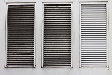Close up of room air conditioning ventilation on the outside wall of the hospital