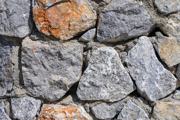 fence made of stone as a background, wall made of stone