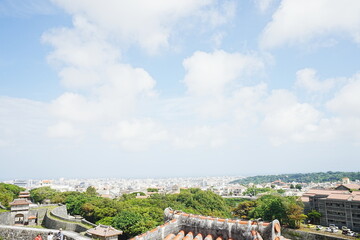 Aerial view of Naha city and sea shore from Shurijo castle in Okinawa, japan. Panorama - 沖縄...