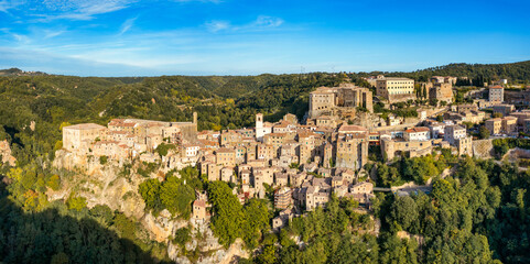 Medieval Pitigliano town over tuff rocks in province of Grosseto, Tuscany, Italy. Pitigliano is a...