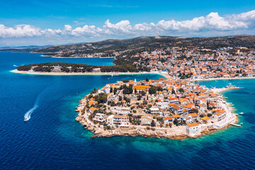 Aerial view of Primosten old town on the islet, Dalmatia, Croatia. Primosten, Sibenik Knin County, Croatia. Resort town on the Adriatic coast. Aerial view of adriatic town Primosten, Croatia - 657133423