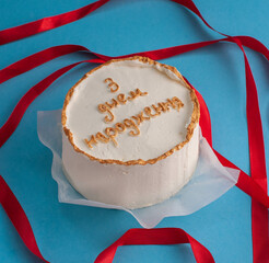  vanilla cakes with name inscriptions on different backgrounds