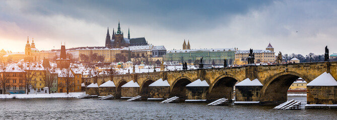 Charles Bridge sunset view of the Old Town pier architecture, Charles Bridge over Vltava river in...